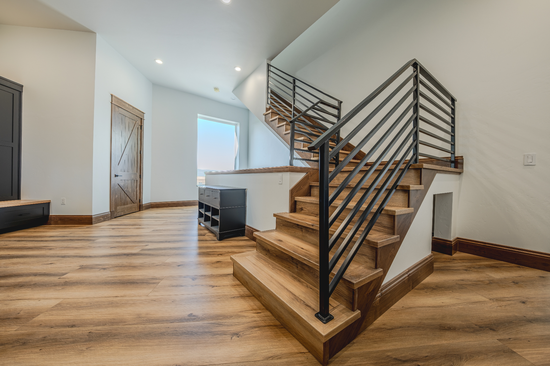 Grand staircase with hardwood treads