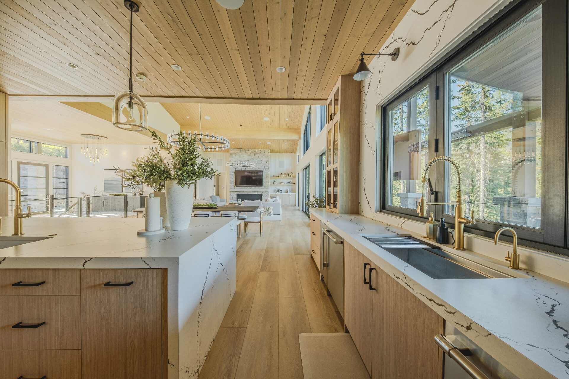 Waterfall island kitchen with stone countertops